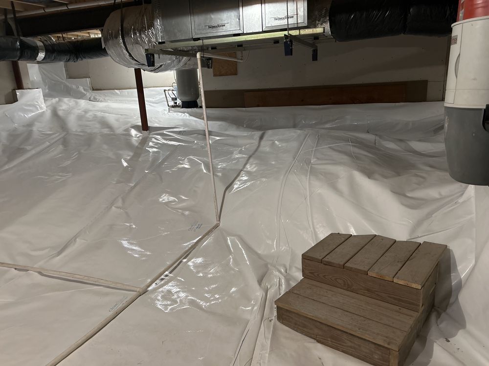 Vapor barrier sealing a crawl space floor, moisture control by Basement Waterproofing Akron