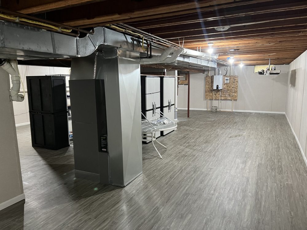 Dry finished basement in Akron, OH after basement waterproofing by our crew